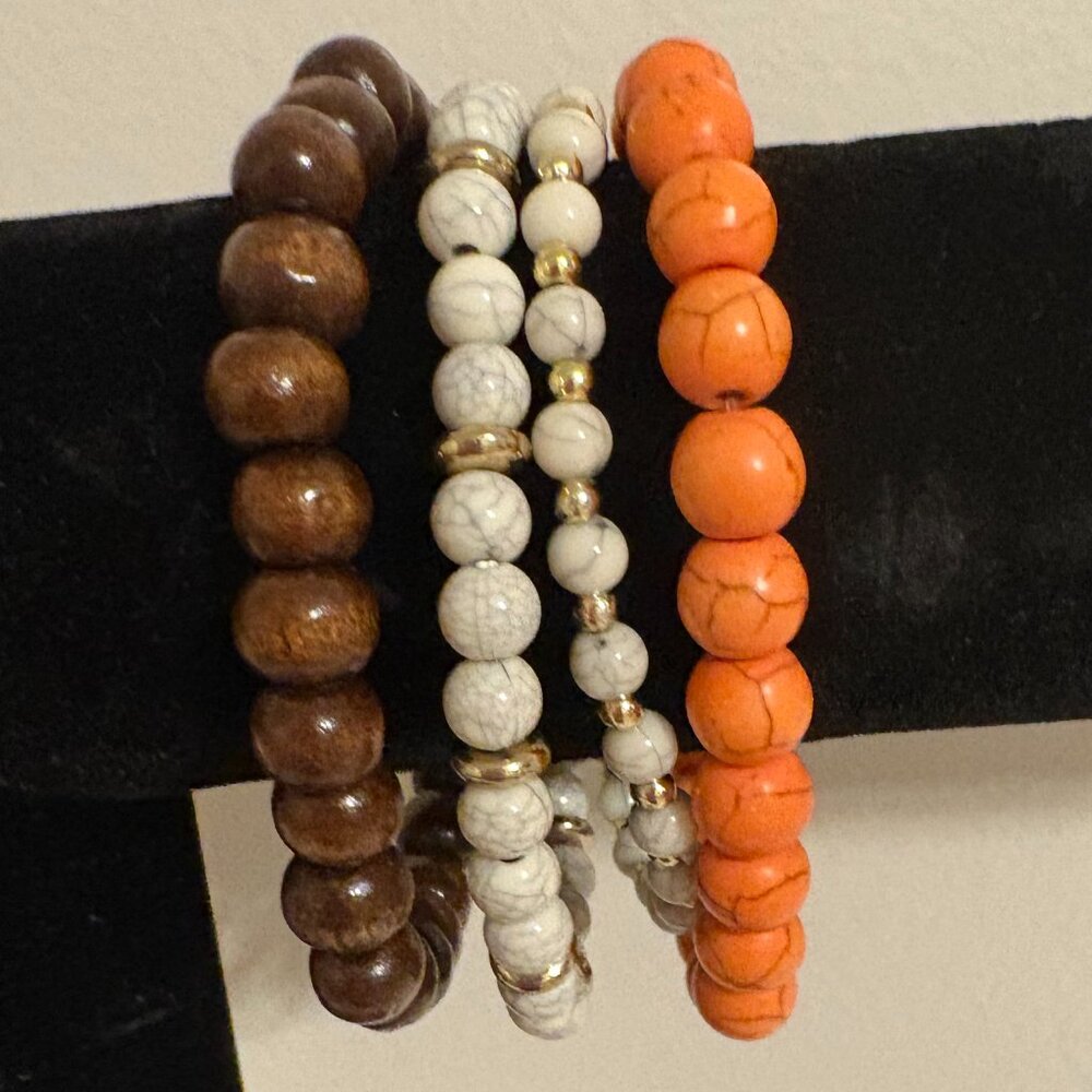 Set of 4 stretch bead bracelets - Brown, orange, & cream